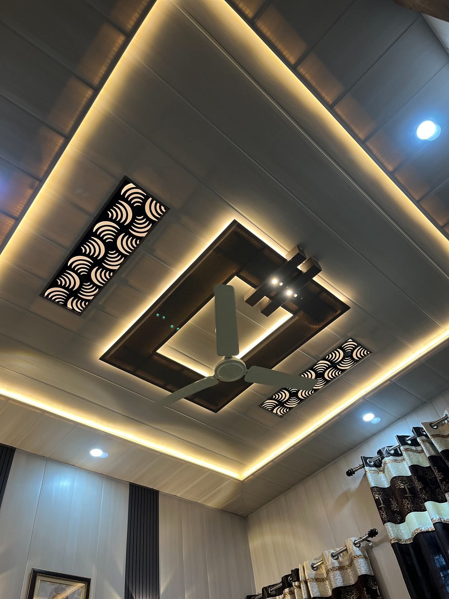 Wooden Panel Ceiling - A stylish ceiling with wooden panels and artistic CNC lighting patterns. by Aamir Enterprises S, POP Ceiling & False Ceiling Contractor in Bhopal, Madhya Pradesh